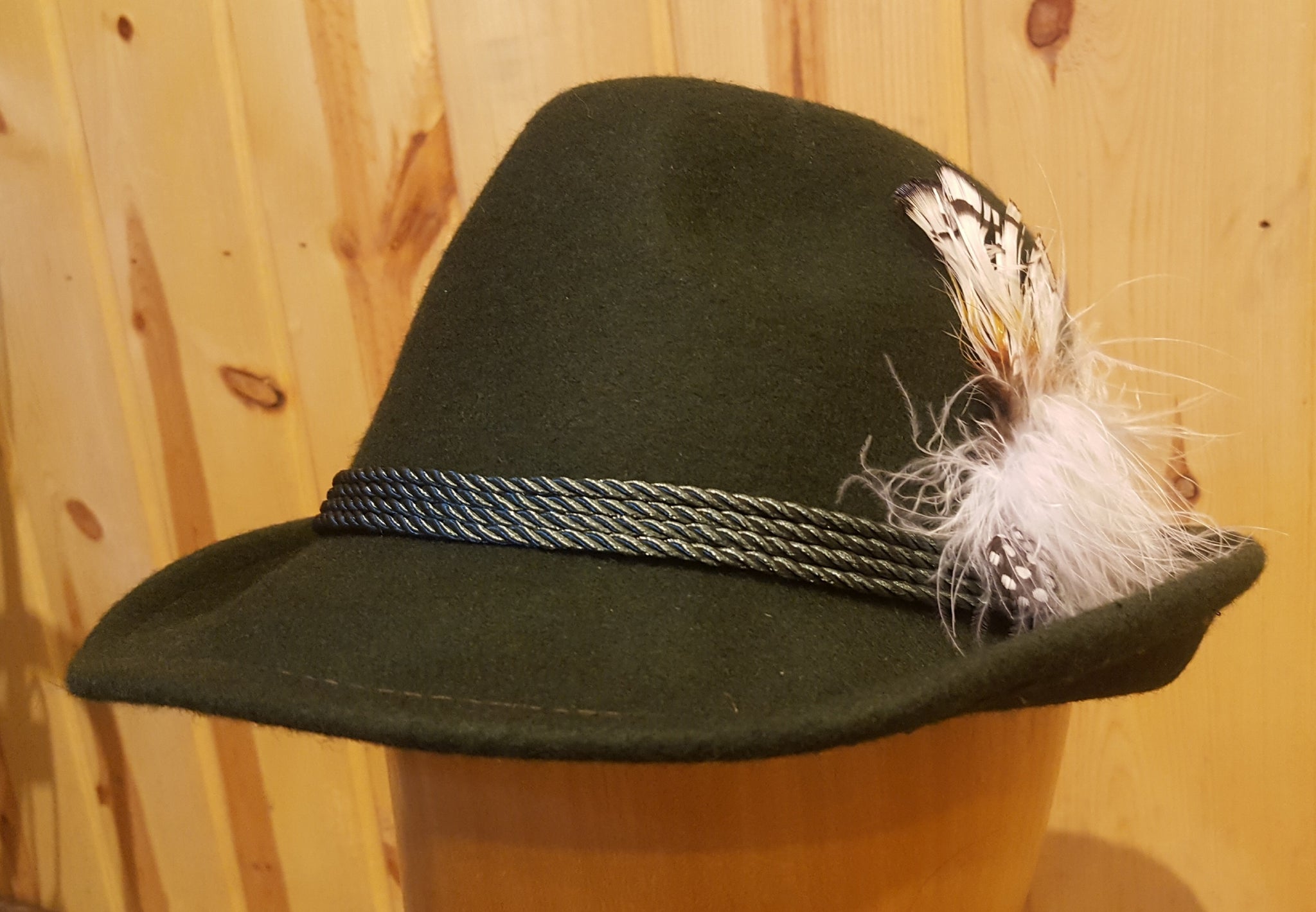 Hat with shop feather name